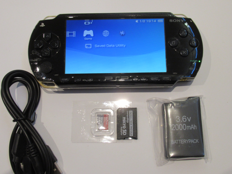 PSP 1000 For Sale Piano Black with Custom Firmware Ark-4, 64GB, USB/data/power cable, region free. 